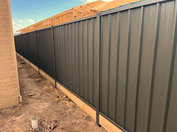Trimscreen Colorbond Fence Installation for New Estates in Clyde North Trimscreen Colorbond fence Woodland Grey installed in a new estate in Clyde North
